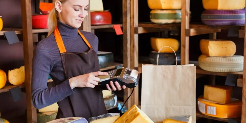 business owner making sale
