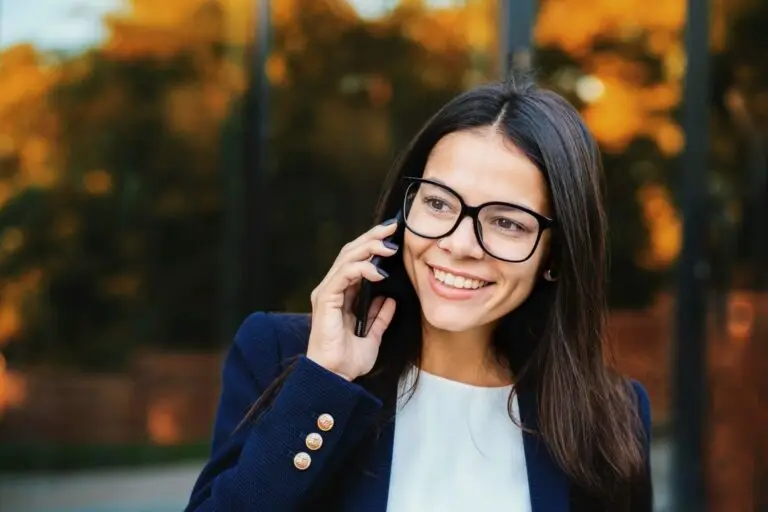 woman smiling on phone