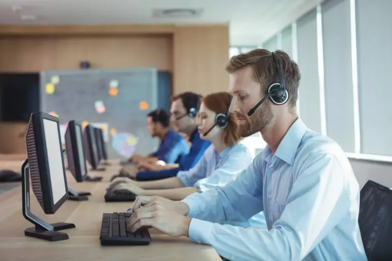 cloud contact center - Businessman typing on keyboard at call center