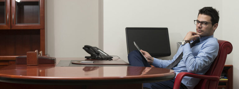 business owner at desk
