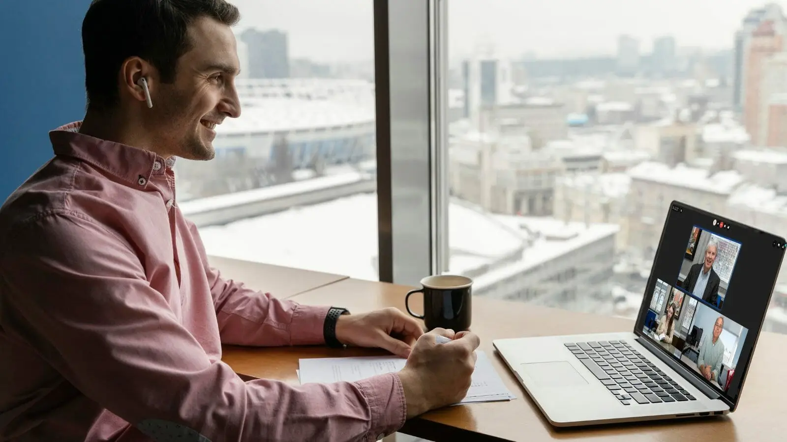 man using a video conferencing solution