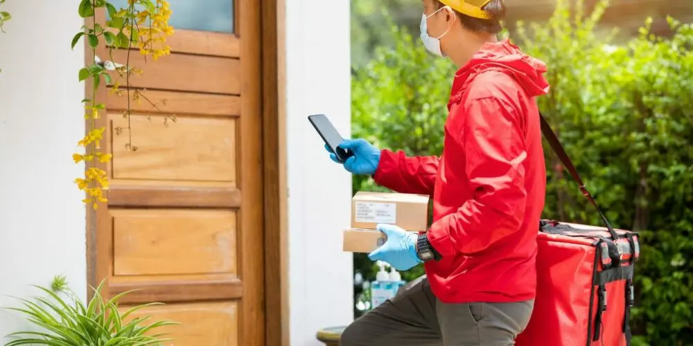 delivery man using business messaging