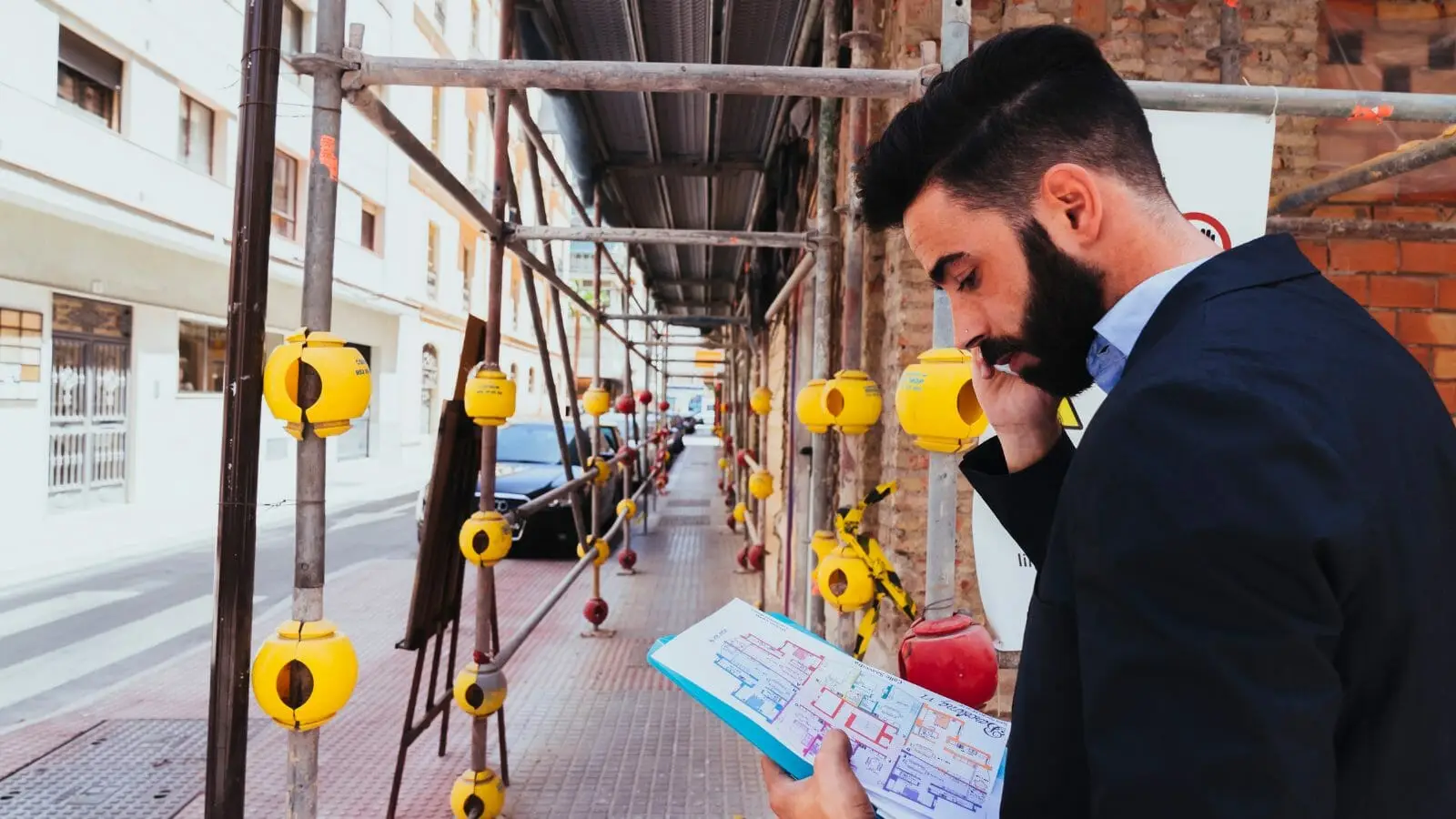 man using a multi-location phone system