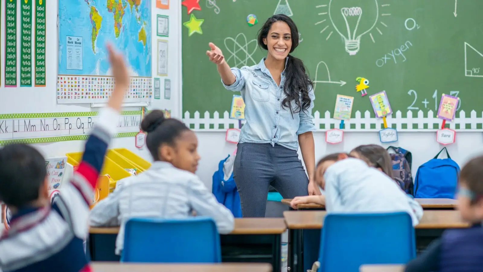 teacher talking about the best phone system for schools