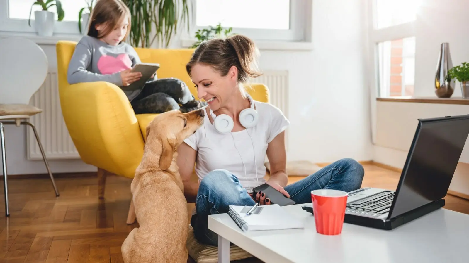 woman using a VoIP hosted PBX while working from home