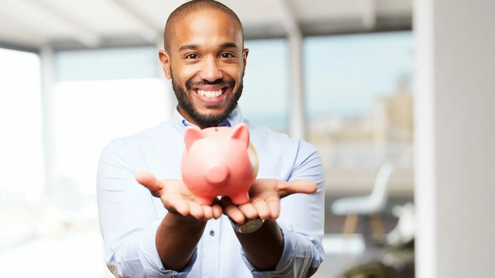 man saving money with digital phone for business